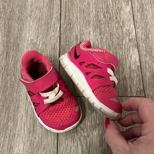 Hot pink baby Nike shoes